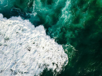 High angle view of rushing waves in seascape