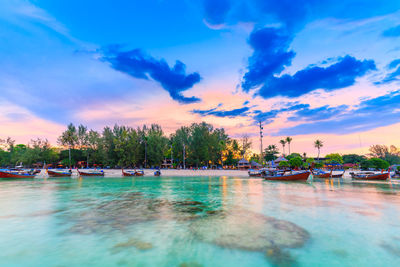 Scenic view of swimming pool against sky during sunset