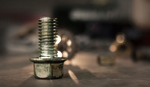 Close-up of rusty metal on table