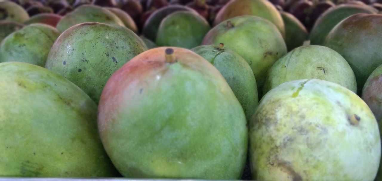 CLOSE-UP OF FRUITS FOR SALE IN MARKET