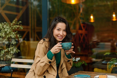 Young woman using mobile phone