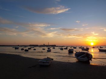 Scenic view of calm sea at sunset