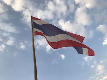 Low angle view of flag against sky