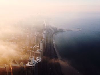 Aerial view of city at sunset