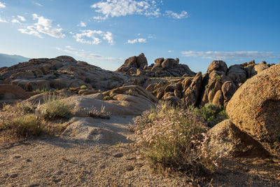 Panoramic view of rocks on sea against sky