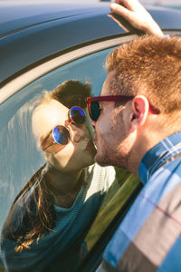 Portrait of young man wearing sunglasses