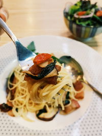 Close-up of pasta in plate on table