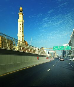 View of road along buildings