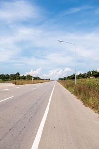 Empty road against sky