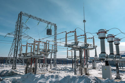 High angle view of electricity pylon against sky