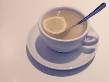 High angle view of coffee cup on table