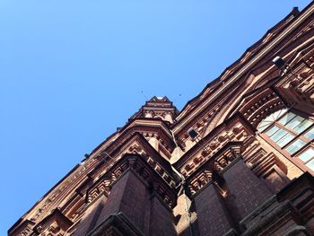 Low angle view of historic building against clear sky