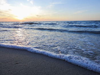 Scenic view of sea against sky during sunset