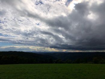 Scenic view of field against sky