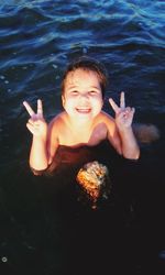 Portrait of smiling boy in water