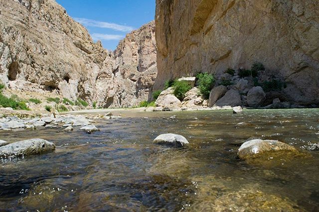 water, rock formation, rock - object, tranquility, tranquil scene, rock, scenics, beauty in nature, nature, mountain, waterfront, geology, river, sky, rocky, idyllic, reflection, physical geography, cliff, lake