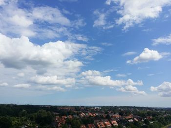 Scenic view of landscape against cloudy sky