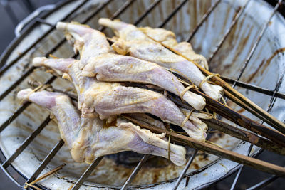 Close-up of meat on barbecue grill