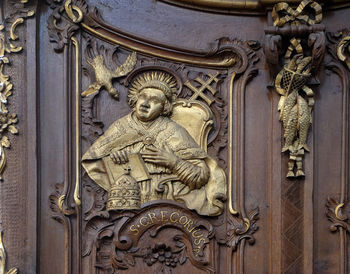 Close-up of statue against door