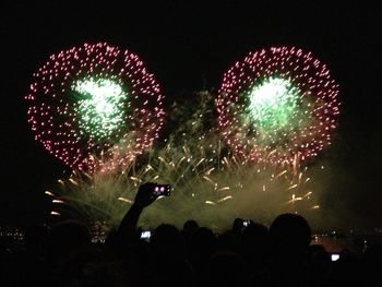 Firework display at night