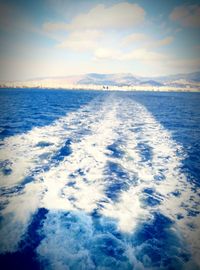 Scenic view of sea against cloudy sky