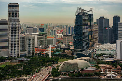 High angle view of buildings in city against sky