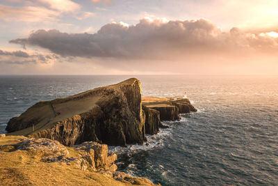 Scenic view of sea against dramatic sky