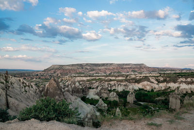 Panoramic view of landscape against cloudy sky