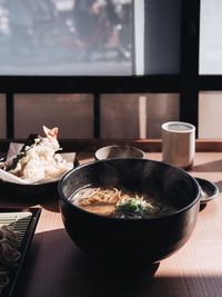 Close-up of noodle soup in bowl on table