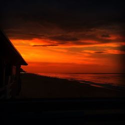 Scenic view of sea at sunset