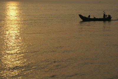 Scenic view of sea at sunset