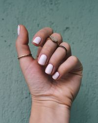 Close-up of woman hand with manicure and jewelry 