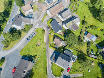High angle view of houses and buildings on field