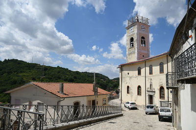 Buildings in city against sky