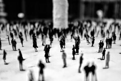 This is a installation art, a group of mini people on the ground to show the flatness of the soul.