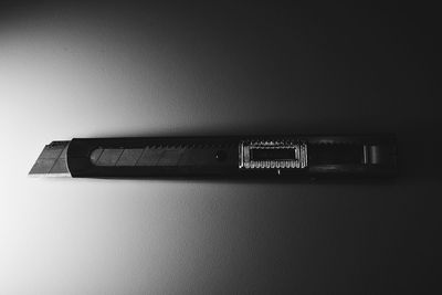 High angle view of pen on table against white background