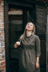 Young beautiful woman with long hair enjoying springtime.