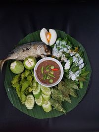 High angle view of fruits in plate on table