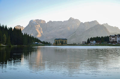 Scenic view of lake and mountains against sky