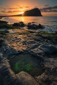 Scenic view of sea against sky during sunset