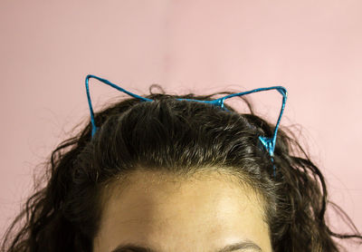 Brunette female head with cat headband