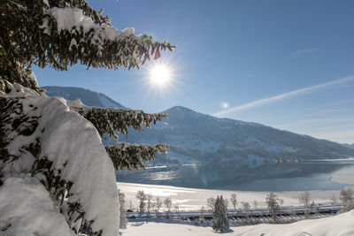 Scenic view of snow covered mountains against sky