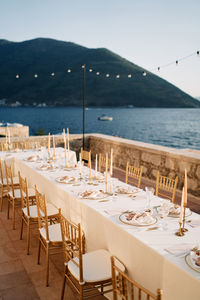 Empty chairs and tables in restaurant