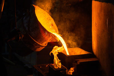 Close-up of molten metal at factory