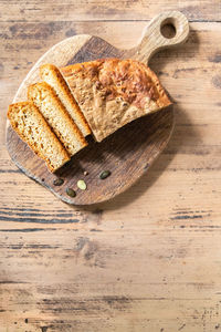 High angle view of bread on cutting board