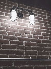 Low angle view of brick wall