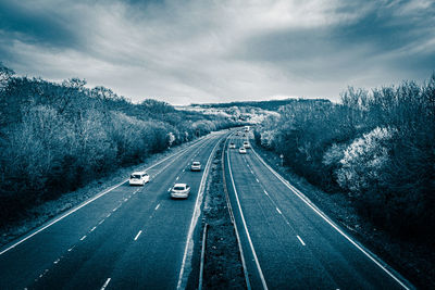 Aerial view of highway against sky