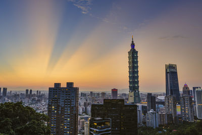 View of buildings against sky during sunset