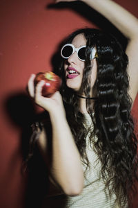 Woman holding apple