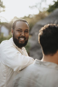 Portrait of young man looking away